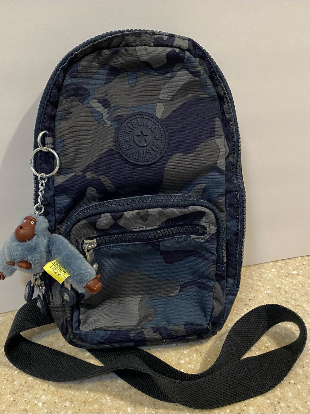 Kipling Navy and Gray Camo Sling Belt Bag with Monkey Charm